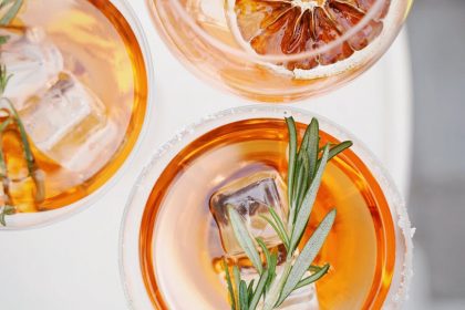 sliced orange fruit in clear drinking glass